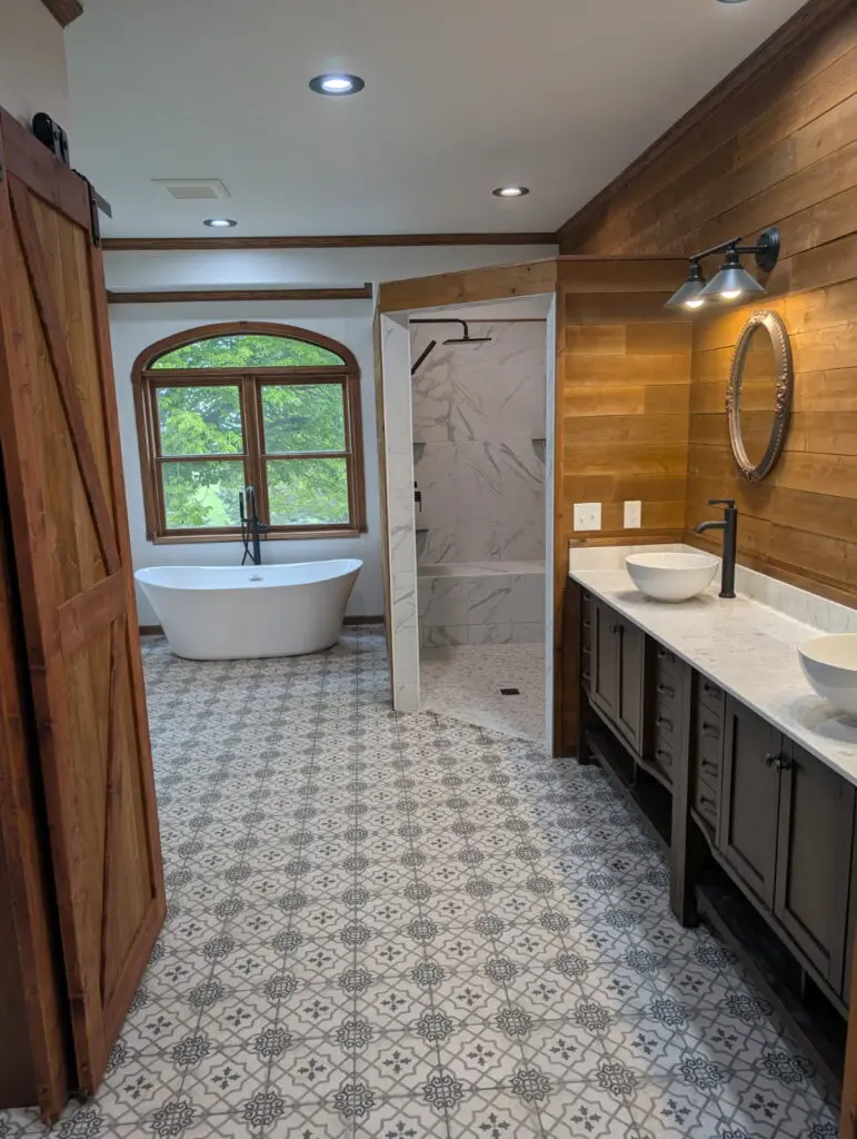 Custom built tile shower and freestanding bathtub